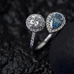 round and pear cut blue diamond ring