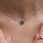 Halo Emerald and Diamond Pendant