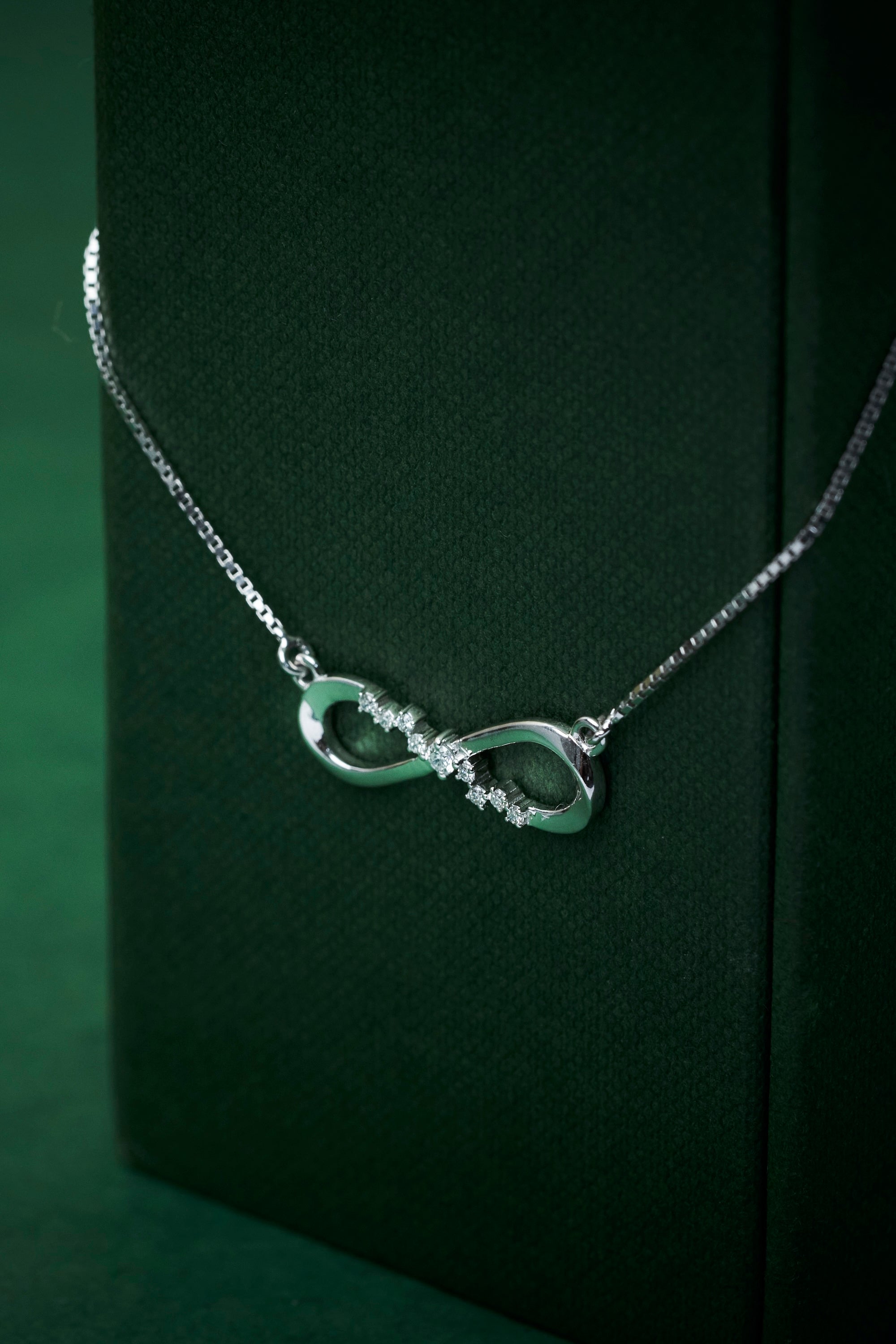 Infinity diamond pendant necklace