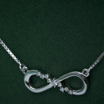 Infinity diamond pendant necklace