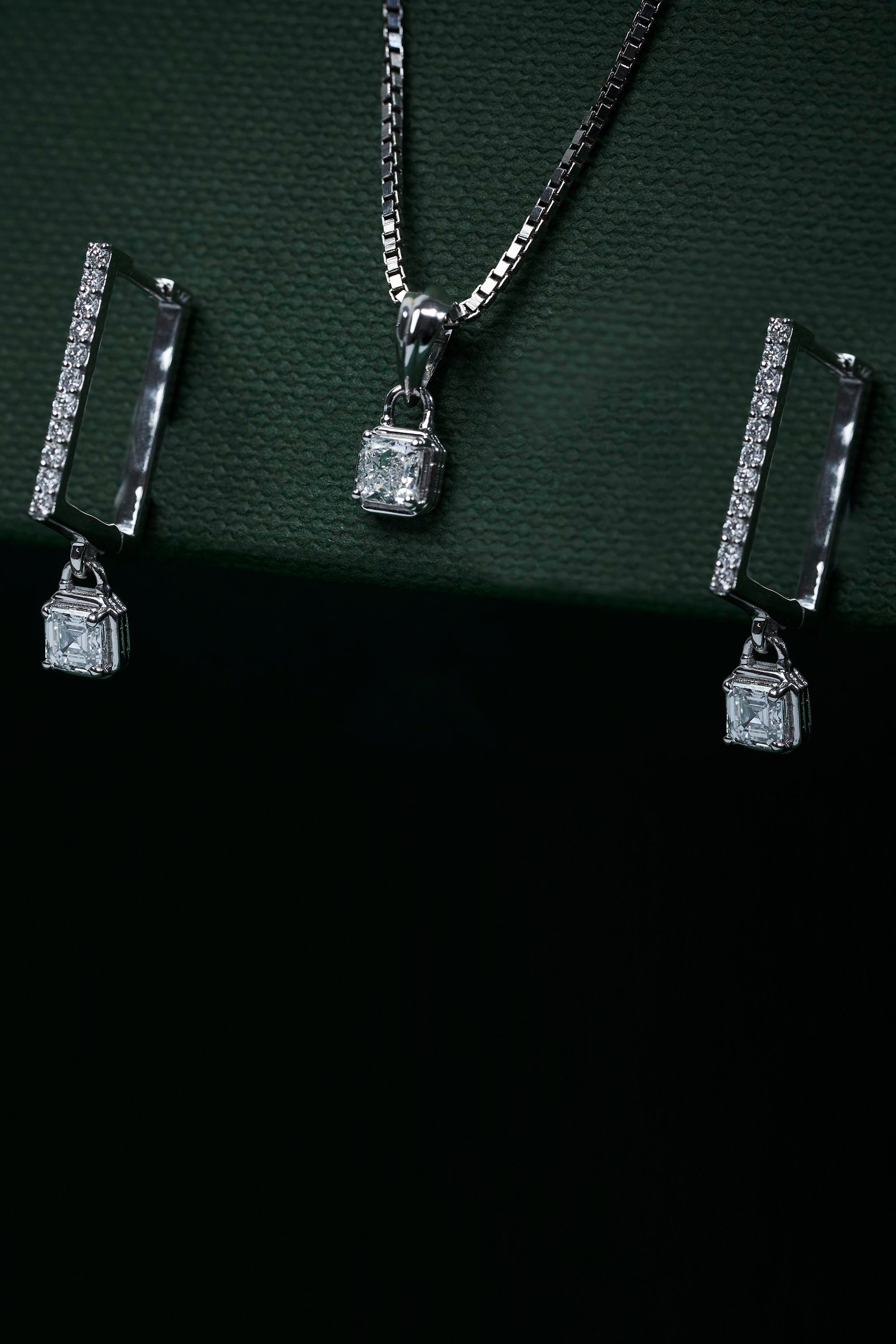 Lock shaped diamond earrings