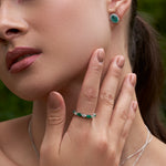 Marquise shaped diamond and emerald band