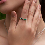 Marquise shaped diamond and emerald band