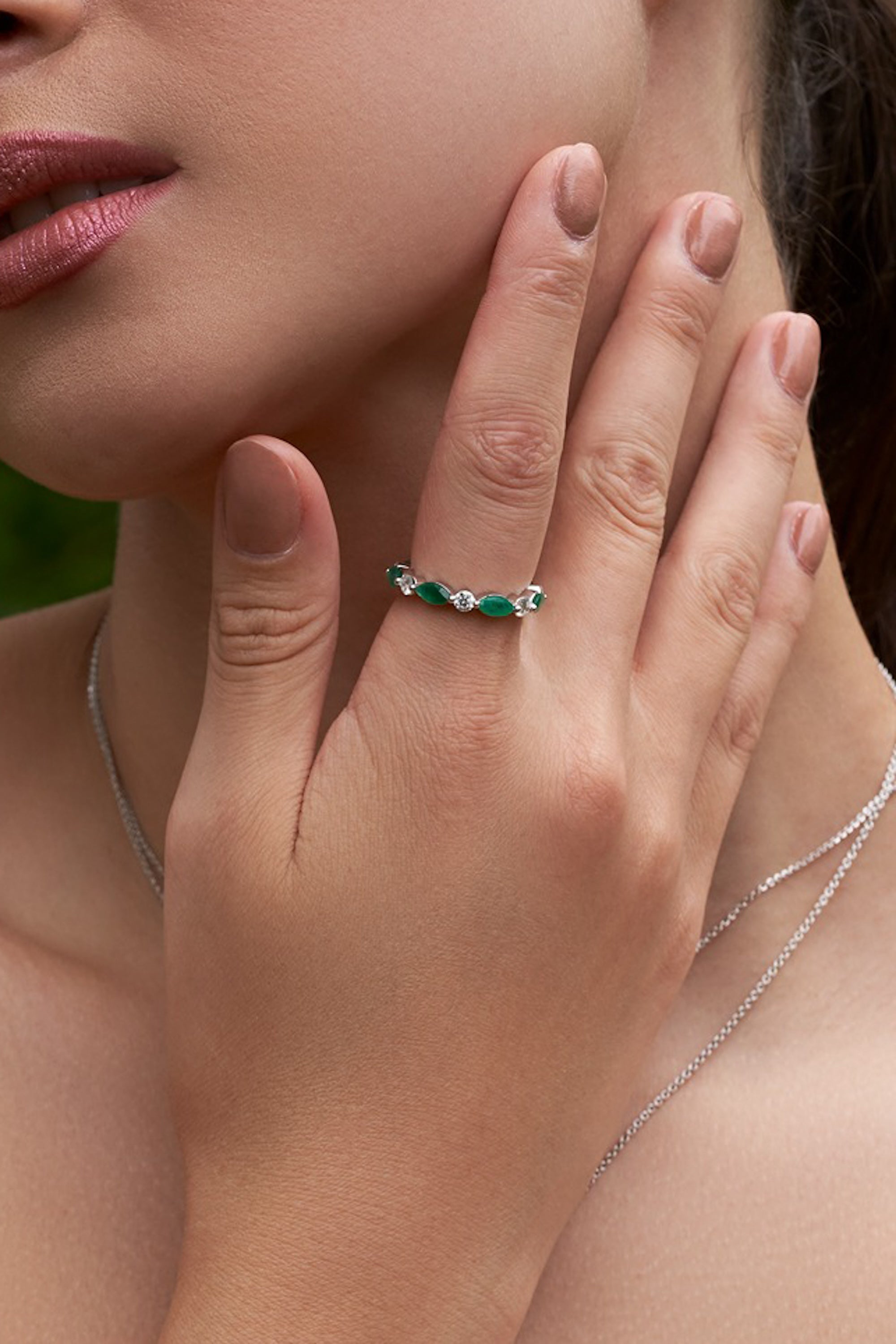 Marquise shaped diamond and emerald band