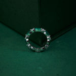 Marquise shaped diamond and emerald band